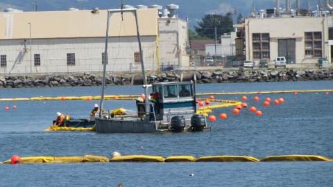 Seaplane Lagoon laying turbidity curtain