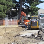Removing lead-contaminated soil from under pavement